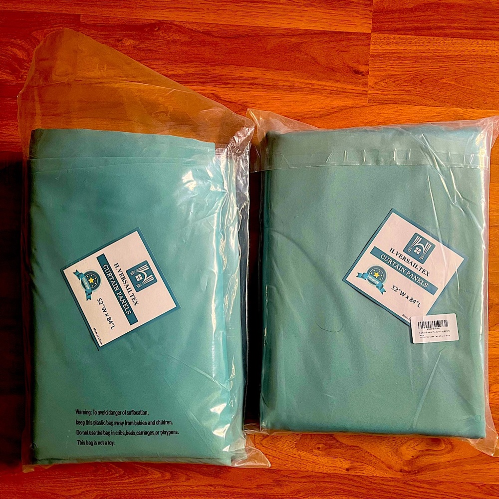 80% Blackout curtains sea green elegant sophisticated look when open.